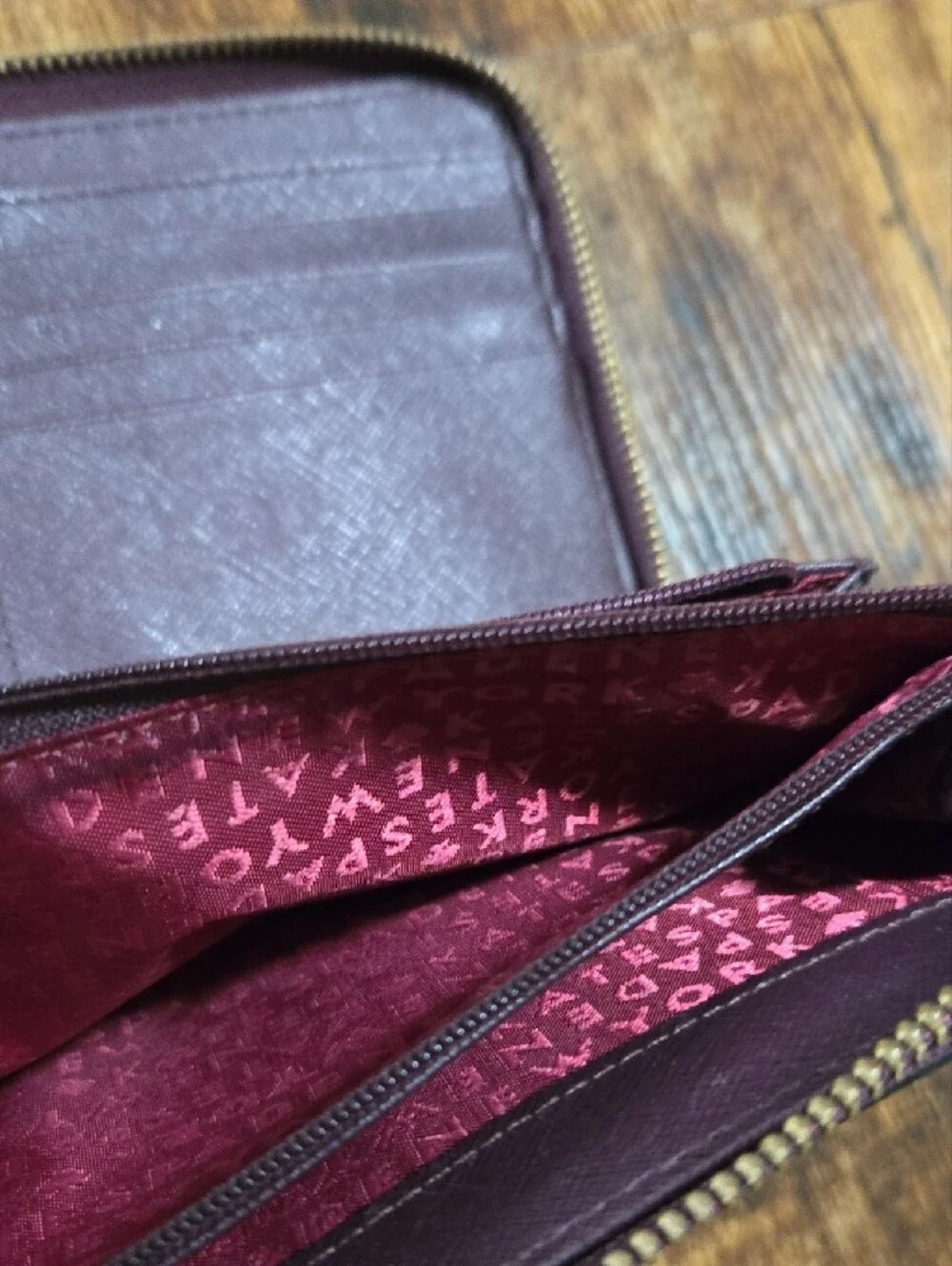 kate spade deep plum Saffiano zip-around leather wallet